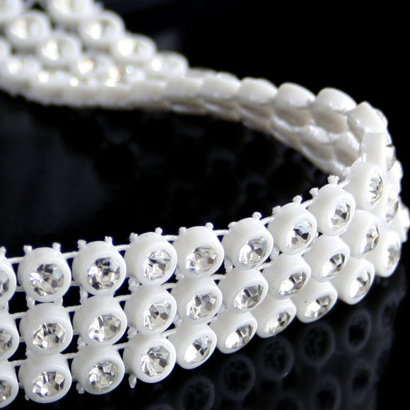 CRYSTAL ON PLASTIC BACKING STRETCH BANDING