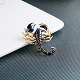Scorpions brooches with dimanate