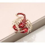 Scorpions brooches with dimanate