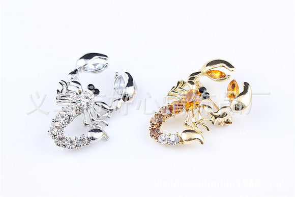 Scorpions brooches with dimanate