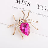 Spider brooches