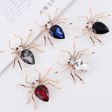 Spider brooches