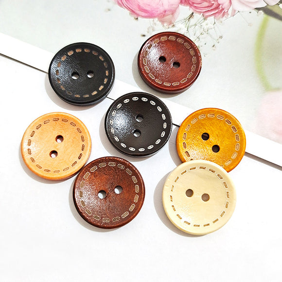 Wooden button with contrast stitching