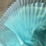 Colored pleated fabric