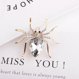 Spider brooches