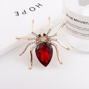 Spider brooches