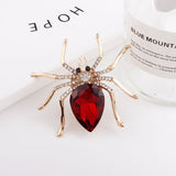 Spider brooches