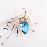 Spider brooches