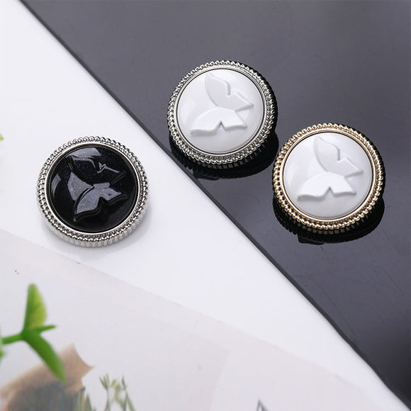 Oil drop butterfly shank buttons