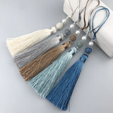 Long tassel with pearl 25cm