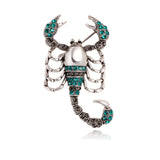 Scorpions brooches with dimanate