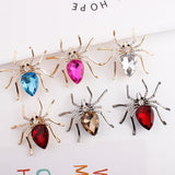 Spider brooches