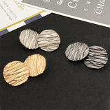 Wave line metal shank buttons