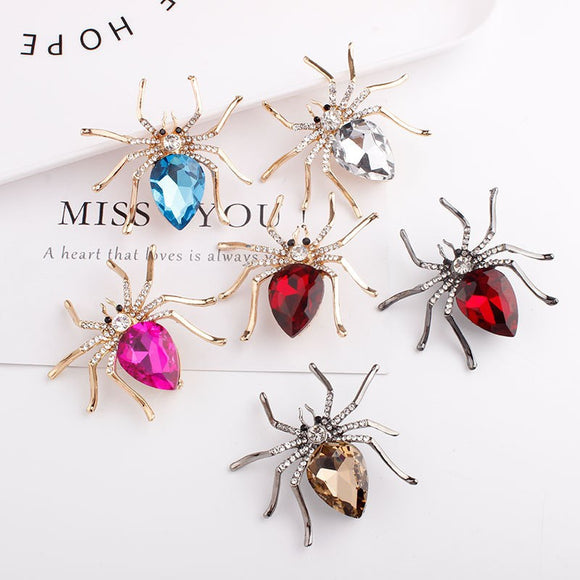 Spider brooches