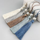 Long tassel with pearl 25cm