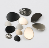 Egg shape metal shank buttons