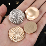 Egg shape metal shank buttons