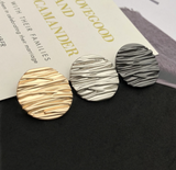 Wave line metal shank buttons