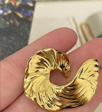 {2026 NEW}  sculptural gold-plated spiral statement metal shank buttons
