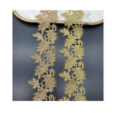 Leaf-patterned Venice lace trim with a scalloped edge.