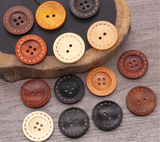 Wooden button with contrast stitching