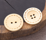 Wooden button with contrast stitching