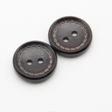 Wooden button with contrast stitching