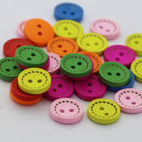 Wooden button with contrast stitching