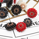 Three-dimensional beaded flower shank buttons