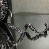 Wave beaded tape