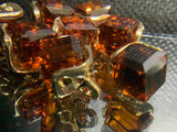 Cubic glass shank buttons