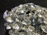 Crystal eye drop brooches