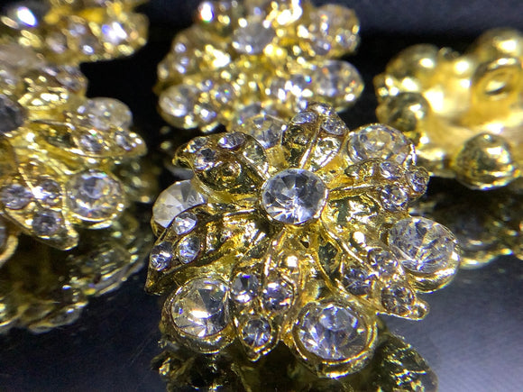 Metal flower button with rhinestone