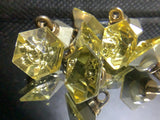 Polygons glass facet button