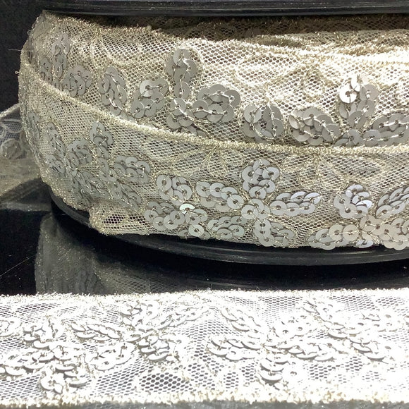 Snowy sequinned mesh trim