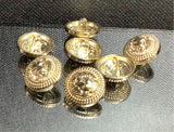 Traditional Balmain lion head buttons