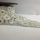 Sequin flower motif on guipure lace
