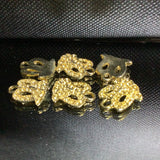 Gold necklace pieces in gold