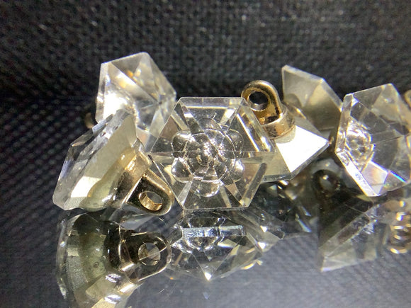 Polygons glass facet button