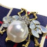 Crystal bee brooches with pearl on strip bows
