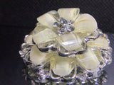 Stone with crystal flower brooches