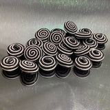 Swirly pattern threading cover button