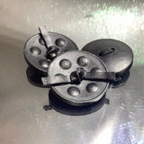 Plastic leather look button