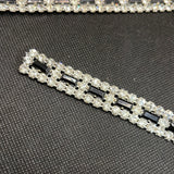 Crystal and black stone trim