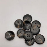 Dish in tortoiseshell button