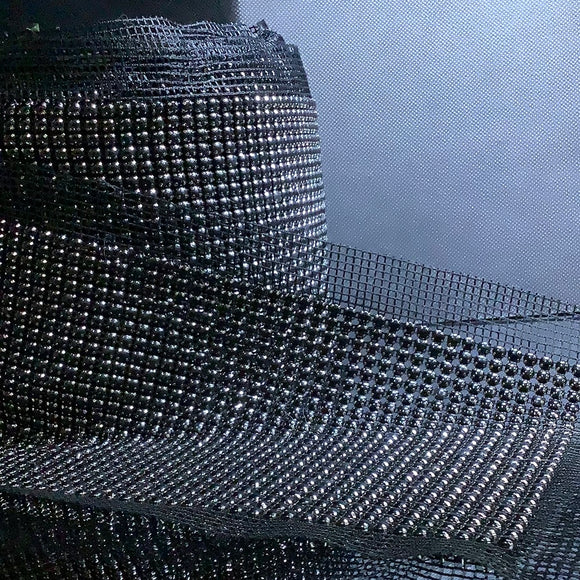 Black stone on netting