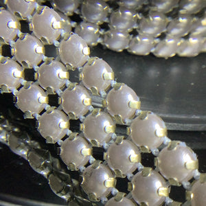 Half dome pearl on metal backing appliqué trim