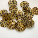 Leopard curved button