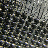 Black stone on netting