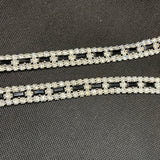 Crystal and black stone trim